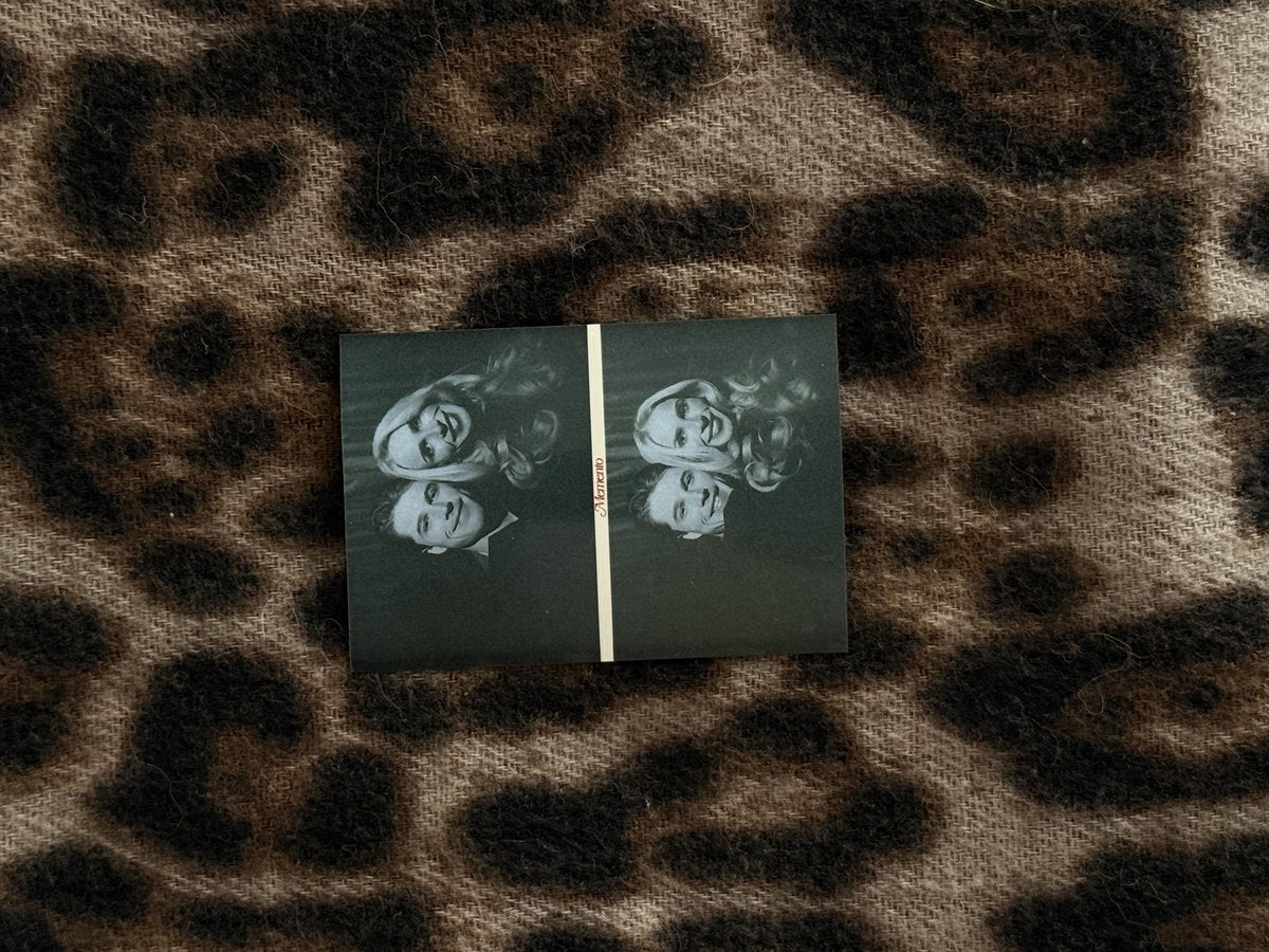 A Memento couple photo on leopard print