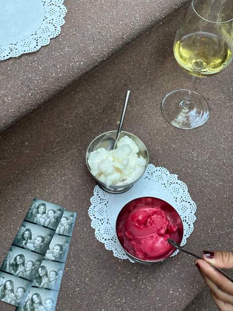 A cup of sorbet beside a fresh Memento photo strip.
